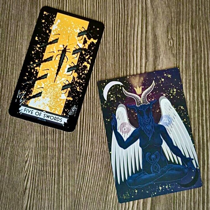 5 of Swords (Giant Thrip) from the Insect Tarot and As above, So Below from the Star & Crown Oracle