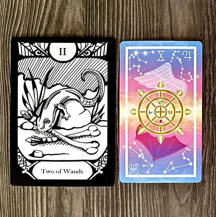 Two of Wands - the Animalis Os Fortuna Tarot and Wheel of Fortune - the Prism Tarot